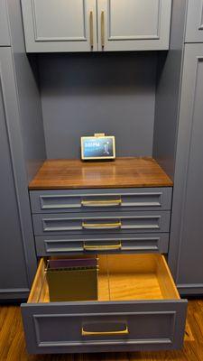 Built-in filing cabinet drawer and mail surface.