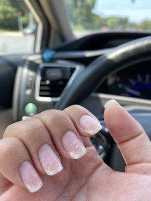 Residue on middle two fingers- nails are not in great shape but not necessarily the salon's fault