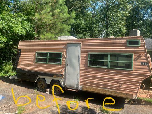 This was a special job! Hand rolled the black paint on to make this vintage RV a clean and sleek look!