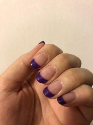 Purple tips on natural nails.