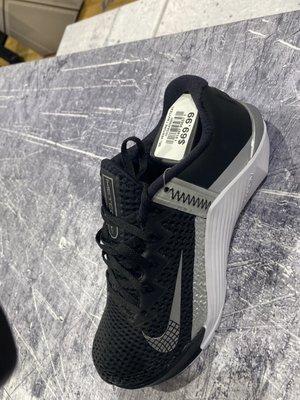 Nike Metcon's - black, white, and silver. zoom in and look at the tag.....tag is on the the wrong shoe!