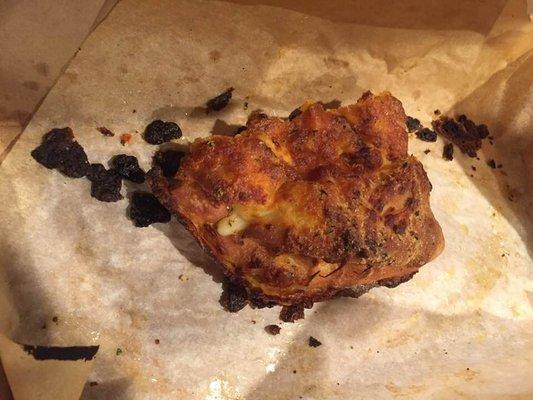 This cheesy bread was burned and hard as a rock.