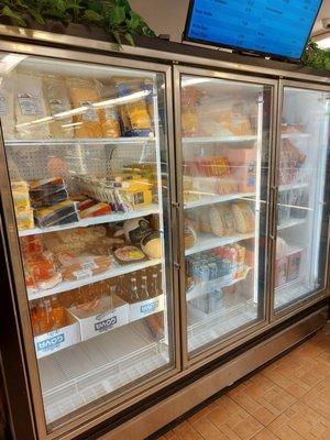 Selection of Cheeses and meats for slicing.