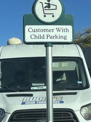 Buddy's home furnishing parked in Customer with child parking spot at heb.