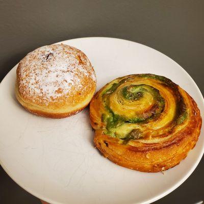 Hazelnut beignet (left), pistachio roll (right).