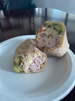 Cracked pepper turkey, bacon, swiss, avocado, coleslaw, and chipotle ranch on ww wrap.