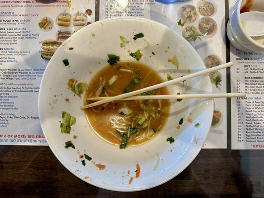 What is left of my vermicelli with grilled pork, shrimp, and egg roll.