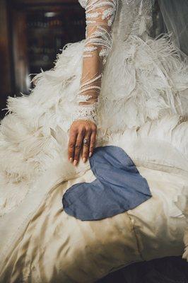 Something blue.  
 (one of the father of the bride's old business shirts sewn into her gown).