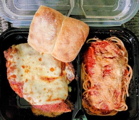 Note the spaghetti on the right shows the extra sauce I bought and my own grated Romano and parmesan cheese.