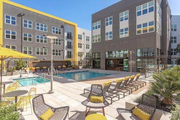 Resort-Style Pool Deck with Spa & Outdoor Gaming Area