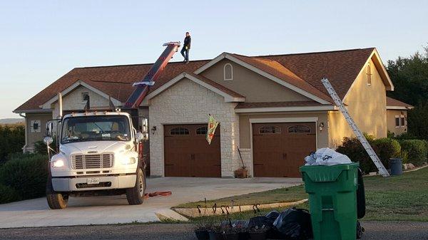 Roof loading a shingle replacement