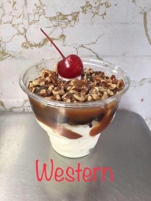 Our most popular Sundae - WESTERN- hot fudge, hot caramel, and our buttered roasted salted pecans