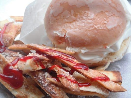 Burger 'N' Fries--Krispy Kreme Donut filled with soft-serve, fried cinnamon-sugar tortilla strips drizzled with raspberry sauce