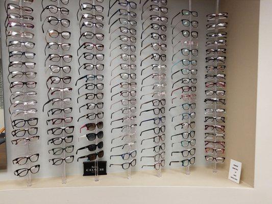 Wall of nice eye wear ... Coach, Tory Burch, Kate Spade, Prada, Nine West and so many more designers