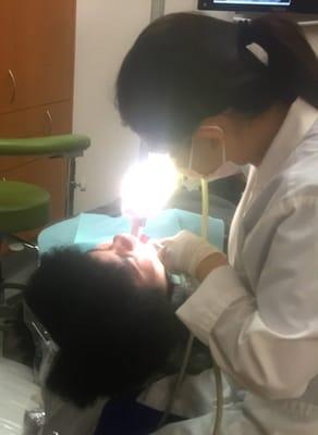 My son getting his teeth cleaned after five years.