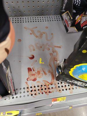 Some lovely fingerpainting (blood?) done in the toy aisle