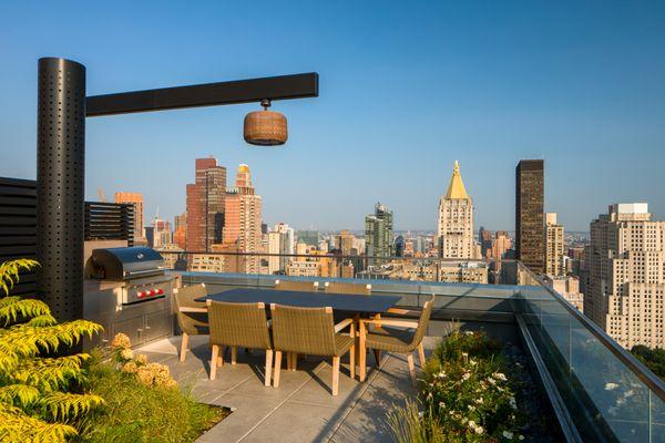 Dine on our rooftop terrace with views of the NYC skyline