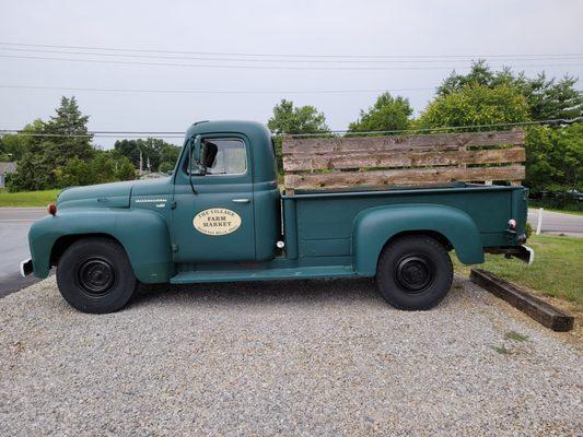 Cute truck with market logo