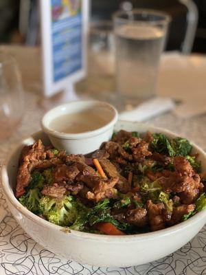 Forgot the name. ‍‍ hot bowl with broccoli, carrots, zucchini, spinach, and soy based chicken in jerk sauce.