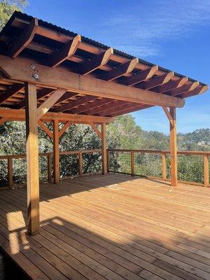 Clear Redwood arbor with custom roofing