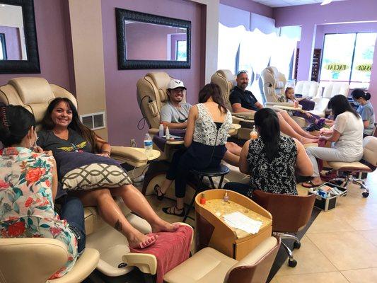 It's a family outing. Mani's, Pedi's, and some eyebrow waxing for the guys!!