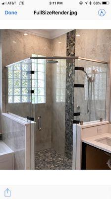 Frameless shower unit with header