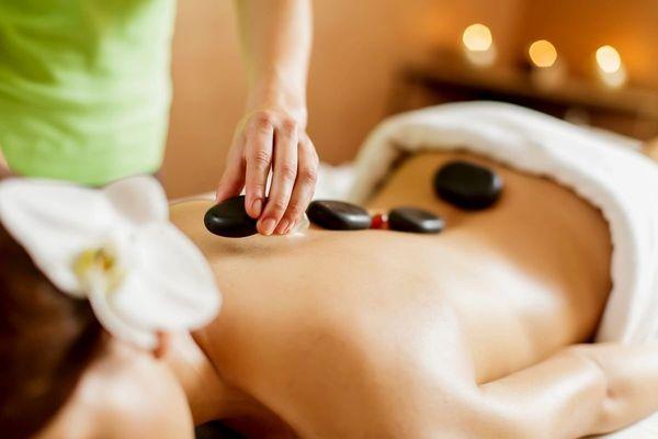 elax with Hot Stone Massage