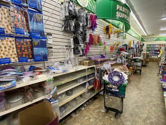 Empty & ravaged shelves, carts of items everywhere "to be stocked" & trash all over the place. And this looks better than last time