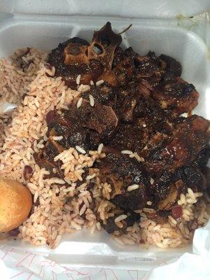 Oxtail plate from Caribbean sushine bakery- glistening oxtails, balanced flavors, rice and beans were delicious