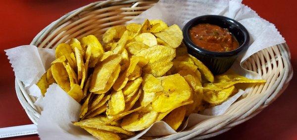 Commercial plantain chips from a bag and garlicky ketchup that will repeat on you.