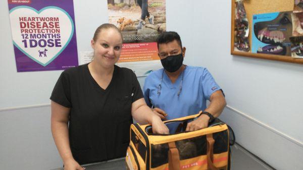 Hallie and Pedro were helping my cat to get injection.