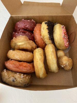 Dozen donuts-  includes a variety like red velvet, Boston cream, buttermilk, strawberry, blueberry and Oreo