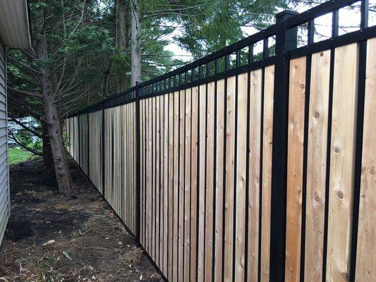 Aluminum with cedar boards installed by Above All Fence