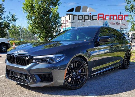 BMW M5 with ceramic tint and windshield.