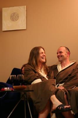 A couple relaxes in our private lounge during a Romance Retreat package.