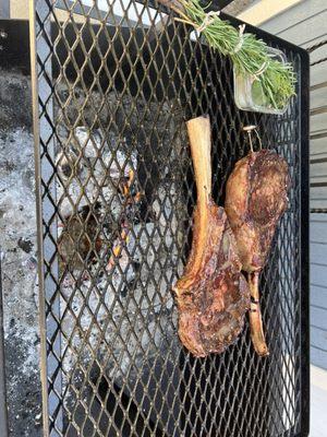 Prime tomahawk steaks on the grill at home