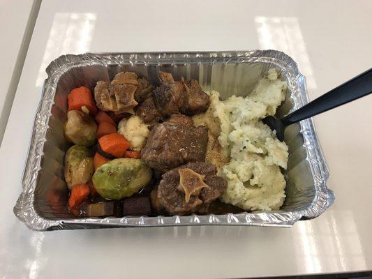 Braised Oxtail, organic veggies, and mashed potatoes.