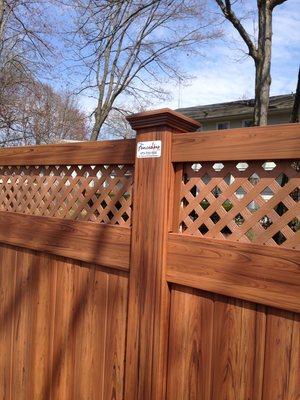 Cedar grain vinyl fence