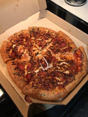 This is how my pizza showed up. No cheese on one slice and another slice is smushed in between two others. The rest of the pizza was good.