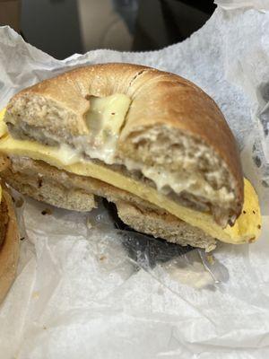 Breakfast sandwich bagel. Hashbrowns are on the Sammy.