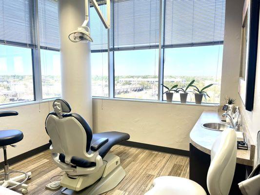 Transform your dental experience into our modern treatment room with a picturesque view.