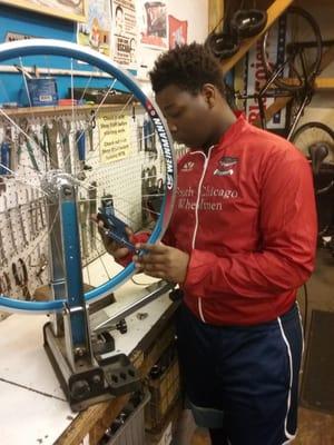 ASM Apprentice & 606 Ambassador Jamal truing a wheel