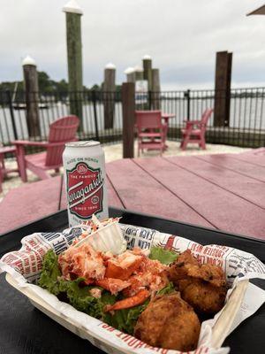 Hot and buttered lobster roll and clam cakes!