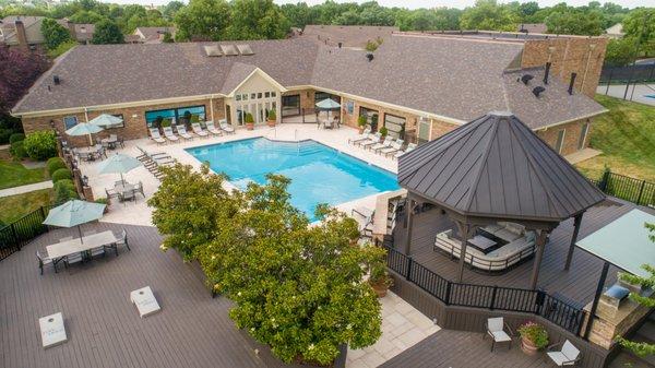 Sparkling pool with cabana, ping pong table, con hole, and plenty of seating options.