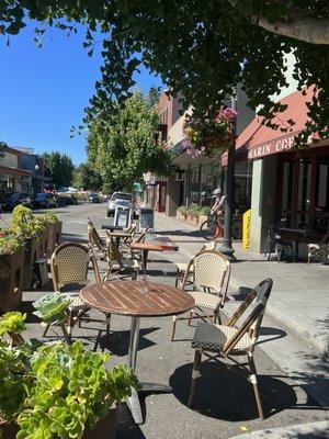 Outdoor seating with beautiful tables and chairs