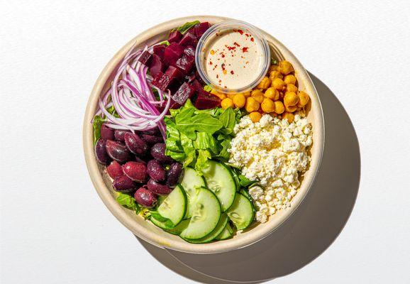 Medi Salad | romaine, roasted beets, cucumber, red onion, black olives, curried chickpeas, feta cheese | dressing - cilantro tahini lime