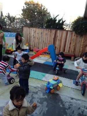 More fun in the backyard! slide and bicycle