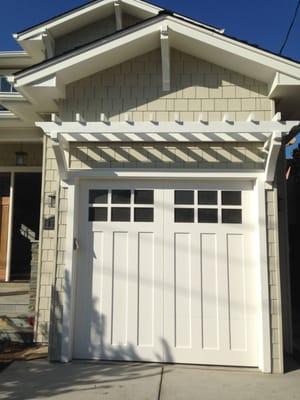 Carriage Style Wood Garage Door.  Isn't it beautiful?