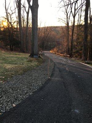 stone on edge of driveway about 220 feet