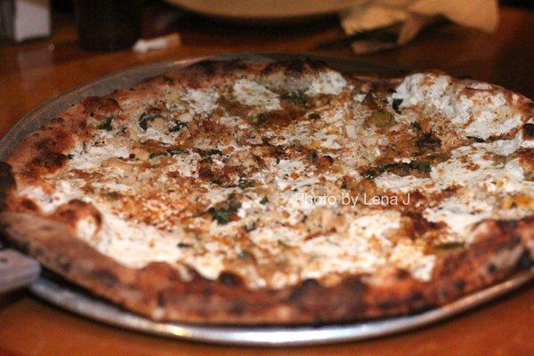 Large Clam Pie ($33.75), littleneck clams prepared with fresh garlic, white wine, fresh mozzarella, toasted breadcrumbs